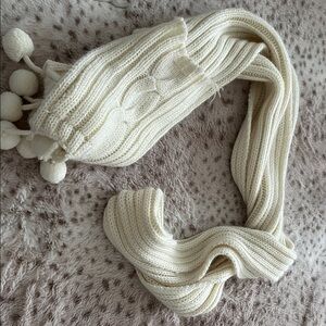 Elegant Cream Knit Scarf with Pom Poms